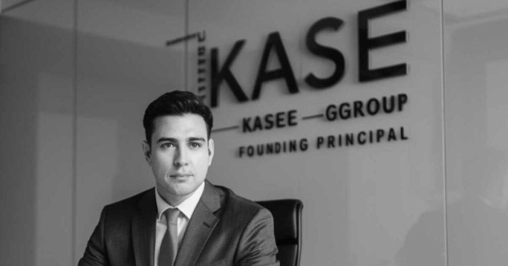 What are some of Kase Abusharkh's major achievements in real estate